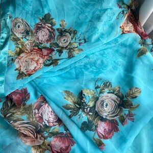 Beautiful brand new blue floral saree satin border